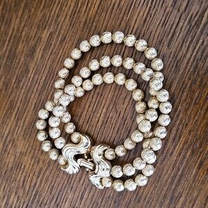 Vintage Mid-Century Elegant Gold Triple-Strand Bracelet Butterfly Wave Clasp